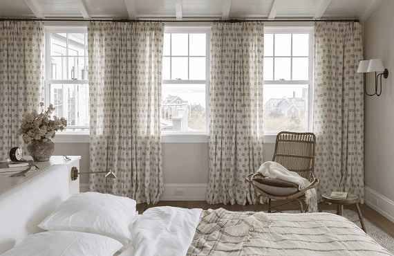 Neutral linen curtain fabric providing a cozy atmosphere