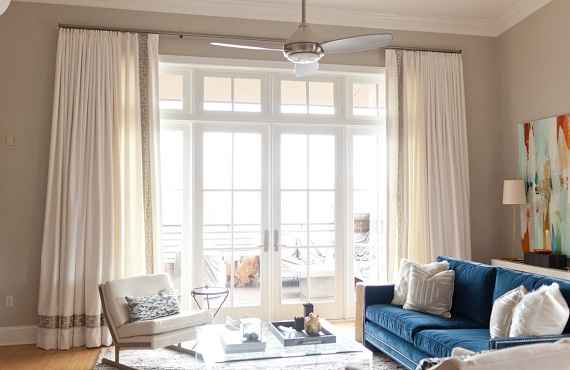 Soft linen drapery panels adding elegance to a living space