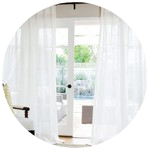 white sheer curtains with white door