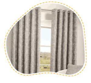 Sheer curtain with gray colour hanging on the white window