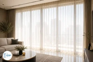 Full-length sheer curtains on floor-to-ceiling windows